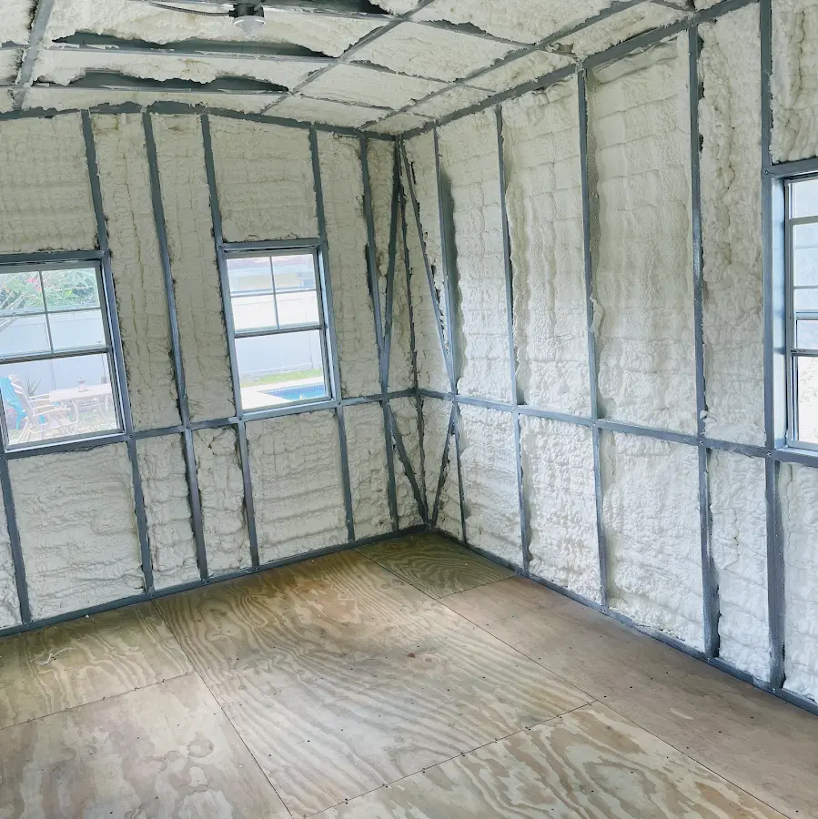 Closed-cell spray foam insulation applied to wall cavities in a residential project in Germantown
